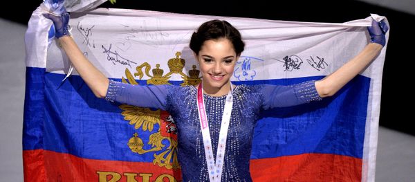 Russia's Yevgeniya Medvedeva, winner of the gold medal in the women's free program competition at the ISU Grand Prix of Figure Skating Final in Barcelona, during the medal ceremony - Sputnik International