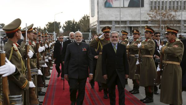 India's Prime Minister Narendra Modi (L) and Afghan Chief Executive Officer Abdullah Abdullah inspect honour guards at the Kabul international airport, after his trip to Kabul, Afghanistan December 25, 2015 India's Prime Minister Narendra Modi (L) and Afghan Chief Executive Officer Abdullah Abdullah inspect honour guards at the Kabul international airport, after his trip to Kabul, Afghanistan December 25, 2015 - Sputnik International
