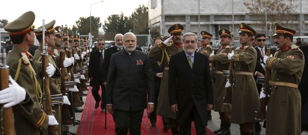 India's Prime Minister Narendra Modi (L) and Afghan Chief Executive Officer Abdullah Abdullah inspect honour guards at the Kabul international airport, after his trip to Kabul, Afghanistan December 25, 2015 India's Prime Minister Narendra Modi (L) and Afghan Chief Executive Officer Abdullah Abdullah inspect honour guards at the Kabul international airport, after his trip to Kabul, Afghanistan December 25, 2015 - Sputnik International