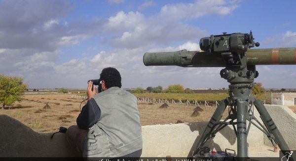 In this file photo released on Dec. 21, 2015, by the Rased News Network on a page affiliated with Islamic State militants, an Islamic State militant prepares to fire a TOW-1 anti-tank missile in Aleppo, northern Syria In this file photo released on Dec. 21, 2015, by the Rased News Network on a page affiliated with Islamic State militants, an Islamic State militant prepares to fire a TOW-1 anti-tank missile in Aleppo, northern Syria - Sputnik International