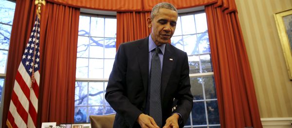 U.S. President Barack Obama reacts as after signing the $1.1 Trillion Government Funding Bill into Law at the Oval Office of the White House in Washington December 18, 2015 U.S. President Barack Obama reacts as after signing the $1.1 Trillion Government Funding Bill into Law at the Oval Office of the White House in Washington December 18, 2015 - Sputnik International