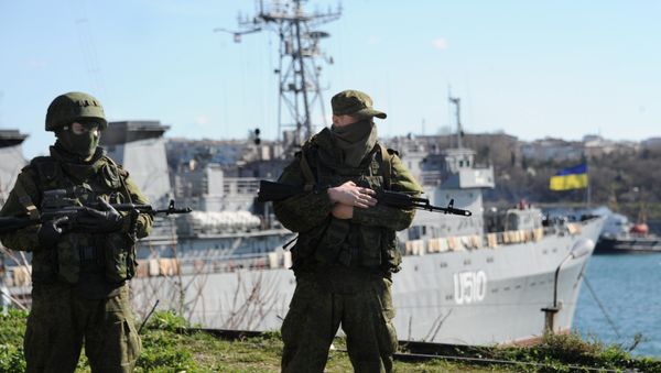Russian forces look out at the Ukrainian navy ship Slavutich in the harbor of the Ukrainian city of Sevastopol on March 5, 2014 Russian forces look out at the Ukrainian navy ship Slavutich in the harbor of the Ukrainian city of Sevastopol on March 5, 2014 - Sputnik International