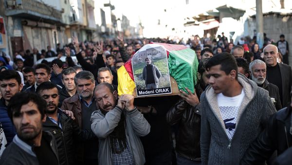 People carry the coffin of Medeni Orak, a man killed in Nusaybin, Turkey, Thursday, Dec. 24, 2015. People carry the coffin of Medeni Orak, a man killed in Nusaybin, Turkey, Thursday, Dec. 24, 2015. - Sputnik International