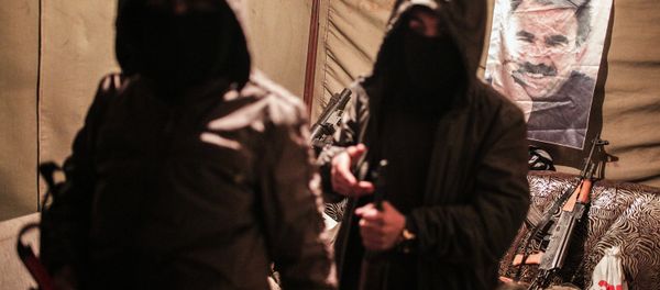 Militants of the Kurdistan Workers' Party, or PKK, stand in a bunker in Sirnak, Turkey, late Wednesday, Dec. 23, 2015. - Sputnik International