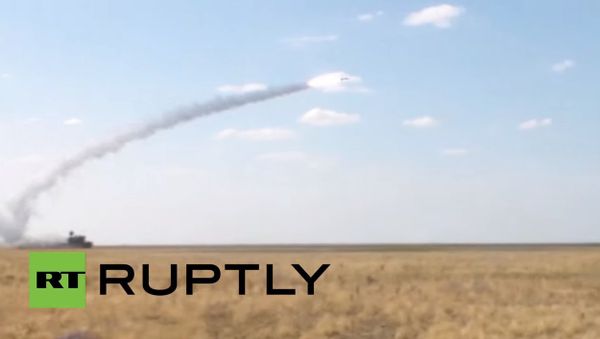 Mighty missiles fired from moving launcher Tor-M2U SAM - Sputnik International