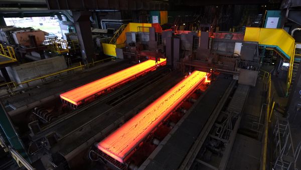 The picture shows red hot steel being flattened in the hot rolling plant at the ThyssenKrupp steel mill Hamborn pictured on December 12, 2014 in Duisburg , western Germany The picture shows red hot steel being flattened in the hot rolling plant at the ThyssenKrupp steel mill Hamborn pictured on December 12, 2014 in Duisburg , western Germany - Sputnik International