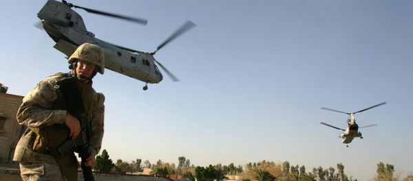 US marine ducks as CH-46 Sea Knight helicopters take off from Ramadi . file photo US marine ducks as CH-46 Sea Knight helicopters take off from Ramadi . file photo - Sputnik International