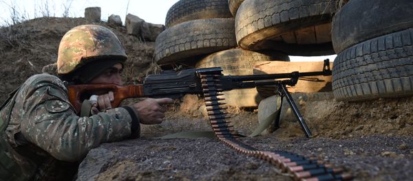 A picture taken on February 16, 2015 shows an Armenian serviceman guarding an area near the village of Movses, close to the border with Azerbaijan - Sputnik International