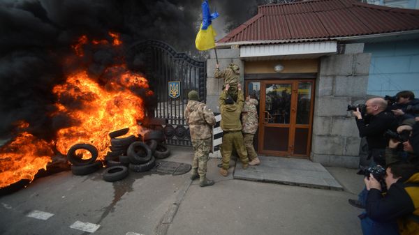Fighters of Aidar Battalion try to storm the gate of the building of the Ukraine Ministry of Defence in Kiev during their protest action Fighters of Aidar Battalion try to storm the gate of the building of the Ukraine Ministry of Defence in Kiev during their protest action - Sputnik International