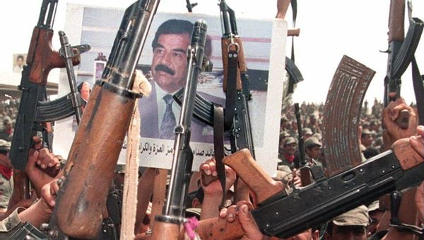 Iraqi soldiers hold up their arms during celebrations to mark the 61st birthday of Iraqi President Saddam Hussein 28 April 1998, in his home town of Tikrit, north of Baghdad Iraqi soldiers hold up their arms during celebrations to mark the 61st birthday of Iraqi President Saddam Hussein 28 April 1998, in his home town of Tikrit, north of Baghdad - Sputnik International