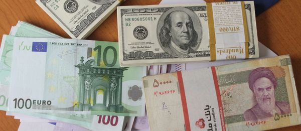 Euro and United States 100-dollar banknotes and Iran's rial banknotes Euro and United States 100-dollar banknotes and Iran's rial banknotes - Sputnik International