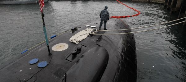 Crew member patrols on the USS Charlotte, a nuclear powered attack submarine, at the Yokosuka Naval Base, south of Tokyo. (File) Crew member patrols on the USS Charlotte, a nuclear powered attack submarine, at the Yokosuka Naval Base, south of Tokyo. (File) - Sputnik International
