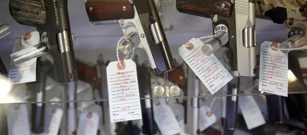 Handguns in a display case at Metro Shooting Supplies, in Bridgeton, Mo. Handguns in a display case at Metro Shooting Supplies, in Bridgeton, Mo. - Sputnik International