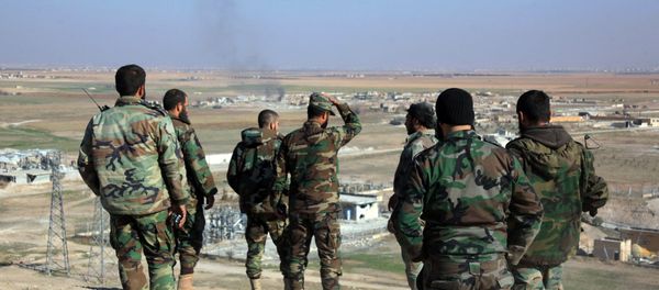 Syrian pro-government fighters look at smoke rising on the horizon following government air strikes on the Tal Sharba area, on the outskirts of the northern Syrian city of Aleppo, after they seized the area from Islamic State (IS) group jihadists on December 27, 2015 Syrian pro-government fighters look at smoke rising on the horizon following government air strikes on the Tal Sharba area, on the outskirts of the northern Syrian city of Aleppo, after they seized the area from Islamic State (IS) group jihadists on December 27, 2015 - Sputnik International