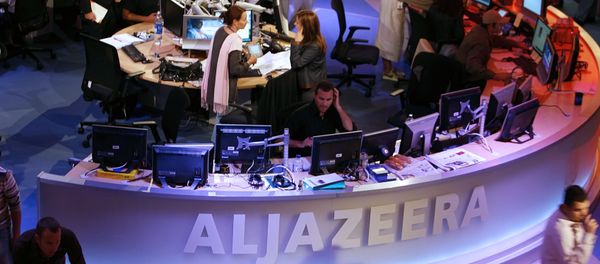 A general view shows the newsroom at the headquarters of the Qatar-based Al-Jazeera satellite channel in Doha - Sputnik International