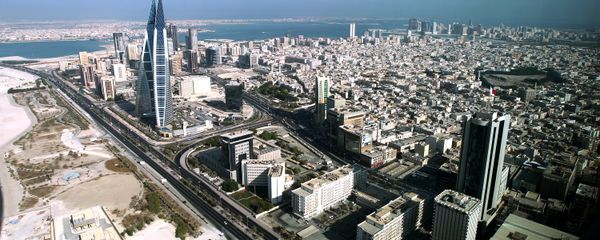 A picture taken through a window shows a general view of Bahrain's captial Manama and nearby cities on October 22, 2010 - Sputnik International