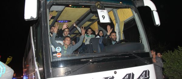 A bus, part of a convoy carrying shiite residents from the Syrian towns of Fuua and Kefraya drive out of Beirut International airport on December 29, 2015, as part of a UN-backed truce. A bus, part of a convoy carrying shiite residents from the Syrian towns of Fuua and Kefraya drive out of Beirut International airport on December 29, 2015, as part of a UN-backed truce. - Sputnik International