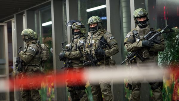 Police is pictured outside the Munich train station on December 31, 2015. - Sputnik International