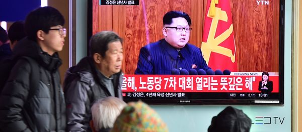 Commuters walk past a television screen showing a broadcast of North Korean leader Kim Jong-Un's New Year speech, at a railroad station in Seoul on January 1, 2016 Commuters walk past a television screen showing a broadcast of North Korean leader Kim Jong-Un's New Year speech, at a railroad station in Seoul on January 1, 2016 - Sputnik International