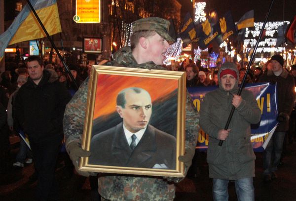 A man carrying a picture of Stepan Bandera during a torchlight procession of Ukrainian nationalists in downtown Kiev. File photo A man carrying a picture of Stepan Bandera during a torchlight procession of Ukrainian nationalists in downtown Kiev. File photo - Sputnik International
