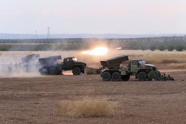 In this photo taken on Wednesday, Oct. 7, 2015, Syrian army rocket launchers fire near the village of Morek in Syria In this photo taken on Wednesday, Oct. 7, 2015, Syrian army rocket launchers fire near the village of Morek in Syria - Sputnik International