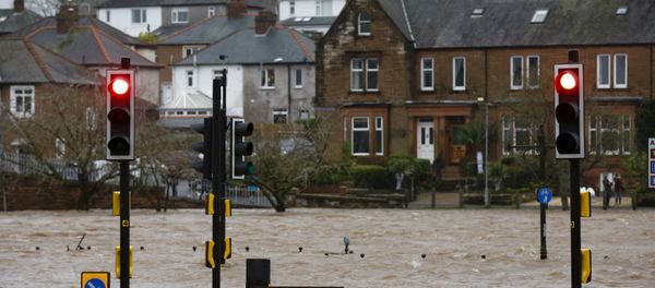A flooded street is pictured in Dumfries, Scotland December 30, 2015 - Sputnik International