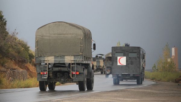 Algerian military trucks are pictured in the Tizi Ouzou region, northern Algeria, on Wednesday, Sept. 23, 2014 - Sputnik International