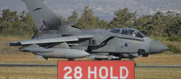 British tornado warplane passes on the runway at the RAF Akrotiri, a British air base near costal city of Limassol, Cyprus, Thursday, Dec. 3, 2015 after an airstrike. British warplanes carried out airstrikes in Syria early Thursday, hours after Parliament voted to authorize air attacks against Islamic State group targets there British tornado warplane passes on the runway at the RAF Akrotiri, a British air base near costal city of Limassol, Cyprus, Thursday, Dec. 3, 2015 after an airstrike. British warplanes carried out airstrikes in Syria early Thursday, hours after Parliament voted to authorize air attacks against Islamic State group targets there - Sputnik International