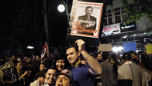 A mock magazine cover displaying Turkish Prime Minister Recep Tayyip Erdogan as Adolf Hitler is shown as thousands gather in central Ankara on June 6, 2013 for a demonstration against the Islamic-rooted government of Erdogan A mock magazine cover displaying Turkish Prime Minister Recep Tayyip Erdogan as Adolf Hitler is shown as thousands gather in central Ankara on June 6, 2013 for a demonstration against the Islamic-rooted government of Erdogan - Sputnik International