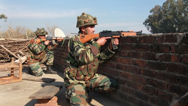 Indian army soldiers take positions on a rooftop of a building outside the Indian airbase in Pathankot, 430 kilometers (267 miles) north of New Delhi, India, Saturday, Jan. 2, 2016 Indian army soldiers take positions on a rooftop of a building outside the Indian airbase in Pathankot, 430 kilometers (267 miles) north of New Delhi, India, Saturday, Jan. 2, 2016 - Sputnik International