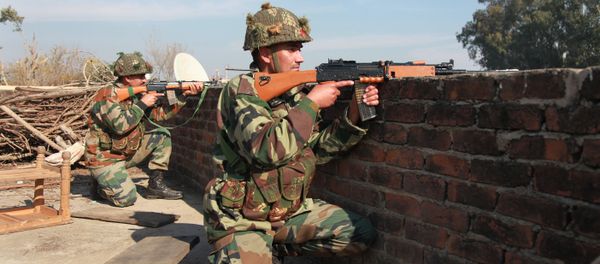 Indian army soldiers take positions on a rooftop of a building outside the Indian airbase in Pathankot, 430 kilometers (267 miles) north of New Delhi, India, Saturday, Jan. 2, 2016 Indian army soldiers take positions on a rooftop of a building outside the Indian airbase in Pathankot, 430 kilometers (267 miles) north of New Delhi, India, Saturday, Jan. 2, 2016 - Sputnik International