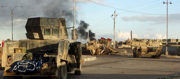 Iraqi security forces' vehicles are seen in the city of Ramadi, January 2, 2016. Picture taken January 2, 2016 Iraqi security forces' vehicles are seen in the city of Ramadi, January 2, 2016. Picture taken January 2, 2016 - Sputnik International