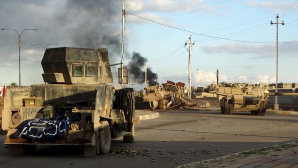 Iraqi security forces' vehicles are seen in the city of Ramadi, January 2, 2016. Picture taken January 2, 2016 Iraqi security forces' vehicles are seen in the city of Ramadi, January 2, 2016. Picture taken January 2, 2016 - Sputnik International