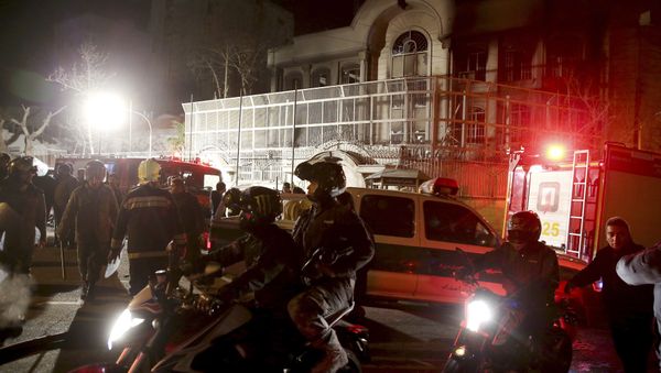 Iranian security protect Saudi Arabia's embassy in Tehran, Iran, while a group of demonstrators gathered to protest execution of a Shiite cleric in Saudi Arabia, Sunday, Jan. 3, 2016 Iranian security protect Saudi Arabia's embassy in Tehran, Iran, while a group of demonstrators gathered to protest execution of a Shiite cleric in Saudi Arabia, Sunday, Jan. 3, 2016 - Sputnik International