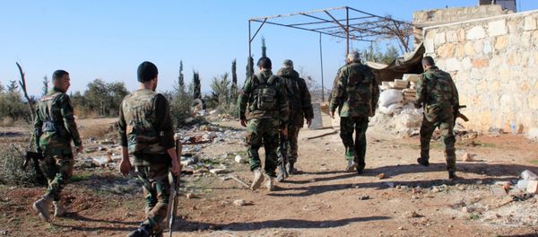 Syrian government forces inspect an area near the village of Khan Tuman, south from the provincial capital Aleppo, on December 22, 2015 Syrian government forces inspect an area near the village of Khan Tuman, south from the provincial capital Aleppo, on December 22, 2015 - Sputnik International