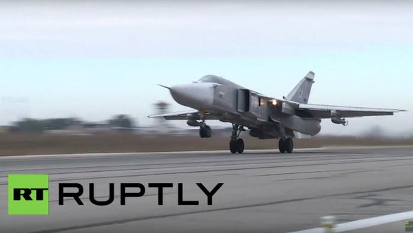 Russian Sukhoi Su-24s and Su-25s continue taking off from Hmeymim Airbase in Syria - Sputnik International
