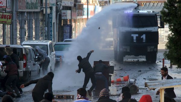 Riot police use a water cannon to disperse stone throwing Kurdish demonstrators during a protest against the curfew in Sur district, in the southeastern city of Diyarbakir, Turkey, December 22, 2015 Riot police use a water cannon to disperse stone throwing Kurdish demonstrators during a protest against the curfew in Sur district, in the southeastern city of Diyarbakir, Turkey, December 22, 2015 - Sputnik International