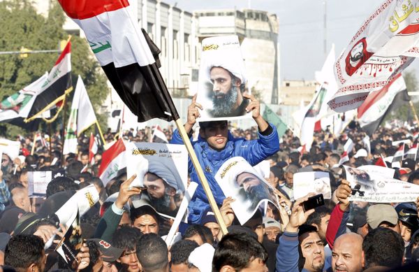 Supporters of Shi'ite cleric Moqtada al-Sadr protest against the execution of Shi'ite Muslim cleric Nimr al-Nimr in Saudi Arabia, during a demonstration in Baghdad January 4, 2016 - Sputnik International