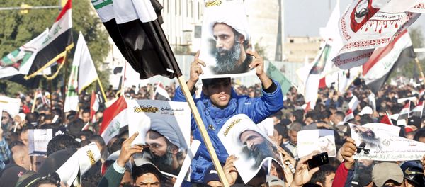 Supporters of Shi'ite cleric Moqtada al-Sadr protest against the execution of Shi'ite Muslim cleric Nimr al-Nimr in Saudi Arabia, during a demonstration in Baghdad January 4, 2016 Supporters of Shi'ite cleric Moqtada al-Sadr protest against the execution of Shi'ite Muslim cleric Nimr al-Nimr in Saudi Arabia, during a demonstration in Baghdad January 4, 2016 - Sputnik International