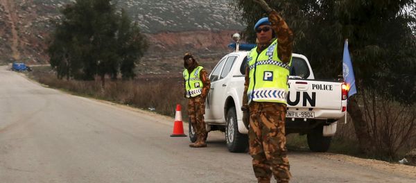 Police members of U.N. peacekeepers of the United Nations Interim Force in Lebanon (UNIFIL) patrol along a road in Marjayoun plain near the Lebanese-Israeli border, southern Lebanon, January 4, 2016 Police members of U.N. peacekeepers of the United Nations Interim Force in Lebanon (UNIFIL) patrol along a road in Marjayoun plain near the Lebanese-Israeli border, southern Lebanon, January 4, 2016 - Sputnik International