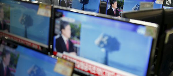 A sales assistant watches TV sets broadcasting a news report on North Korea's nuclear test, in Seoul, January 6, 2016 A sales assistant watches TV sets broadcasting a news report on North Korea's nuclear test, in Seoul, January 6, 2016 - Sputnik International