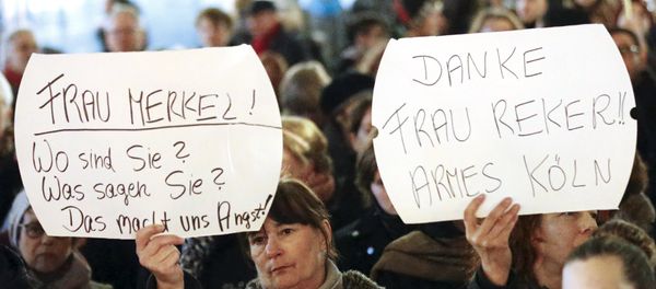 Women hold up placards that read Mrs. Merkel: Where are you? What are you saying? This worries us! and Thanks (Cologne mayor Henriette) Reker!! Poor Cologne (R) during a protest in front of the Cologne Cathedral, Germany, January 5, 2016 Women hold up placards that read Mrs. Merkel: Where are you? What are you saying? This worries us! and Thanks (Cologne mayor Henriette) Reker!! Poor Cologne (R) during a protest in front of the Cologne Cathedral, Germany, January 5, 2016 - Sputnik International