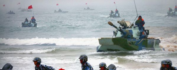 Chinese amphibious tanks and marines storm a beachhead in an amphibious assault drill during the third phase of the Sino-Russian joint military exercise Chinese amphibious tanks and marines storm a beachhead in an amphibious assault drill during the third phase of the Sino-Russian joint military exercise - Sputnik International