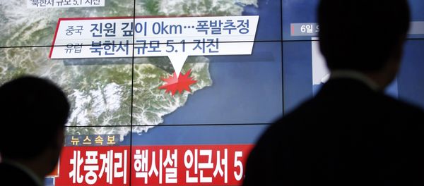 People walk by a screen showing the news reporting about an earthquake near North Korea's nuclear facility, in Seoul, South Korea, Wednesday, Jan. 6, 2016. People walk by a screen showing the news reporting about an earthquake near North Korea's nuclear facility, in Seoul, South Korea, Wednesday, Jan. 6, 2016. - Sputnik International