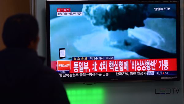 People watch a news report on North Korea's first hydrogen bomb test at a railroad station in Seoul People watch a news report on North Korea's first hydrogen bomb test at a railroad station in Seoul - Sputnik International