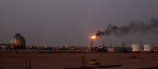 A flame from a Saudi Aramco (the national oil company) oil installation known as Pump 3 burns brightly during sunset in the Saudi Arabian desert near the oil-rich area Al-Khurais, 160 kms east of the capital Riyadh A flame from a Saudi Aramco (the national oil company) oil installation known as Pump 3 burns brightly during sunset in the Saudi Arabian desert near the oil-rich area Al-Khurais, 160 kms east of the capital Riyadh - Sputnik International