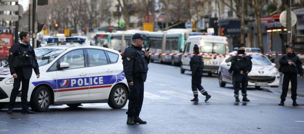 French police secure the area after a man was shot dead at a police station in the 18th district in Paris, France January 7, 2016 French police secure the area after a man was shot dead at a police station in the 18th district in Paris, France January 7, 2016 - Sputnik International