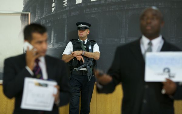 An armed British policeman secures terminal 4 at Heathrow airport, London. An armed British policeman secures terminal 4 at Heathrow airport, London. - Sputnik International