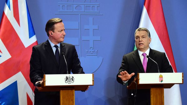 Hungarian Prime Minister Viktor Orban (R) and his British counterpart David Cameron (L) attend a press conference in Budapest Hungarian Prime Minister Viktor Orban (R) and his British counterpart David Cameron (L) attend a press conference in Budapest - Sputnik International