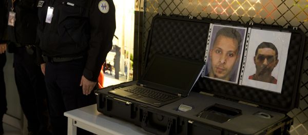 Police officers stand next to the wanted notice of terrorist Salah Abdeslam (L) and Mohamed Abrini on December 3, 2015 at the Roissy-Charles-de-Gaulle airport in Roissy-en-France, outside Paris. Police officers stand next to the wanted notice of terrorist Salah Abdeslam (L) and Mohamed Abrini on December 3, 2015 at the Roissy-Charles-de-Gaulle airport in Roissy-en-France, outside Paris. - Sputnik International